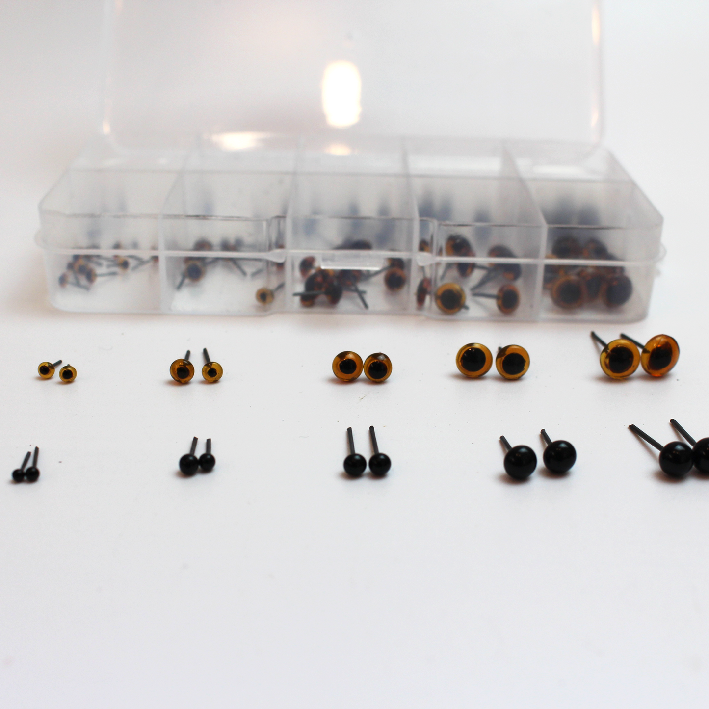 Mixed size and colour glue-in eyes in handy box